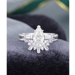 Load image into Gallery viewer, 0.75 PEAR SHAPED WHITE GOLD DIAMOND BAGUETTE MOISSANITE ENGAGEMENT RING SET