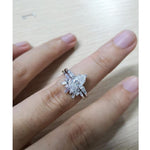 Load image into Gallery viewer, 0.75 PEAR SHAPED WHITE GOLD DIAMOND BAGUETTE MOISSANITE ENGAGEMENT RING SET