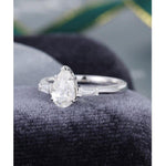 Load image into Gallery viewer, 0.75 PEAR SHAPED WHITE GOLD DIAMOND BAGUETTE MOISSANITE ENGAGEMENT RING SET