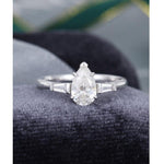 Load image into Gallery viewer, 0.75 PEAR SHAPED WHITE GOLD DIAMOND BAGUETTE MOISSANITE ENGAGEMENT RING SET