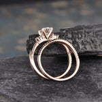 Load image into Gallery viewer, 1.00CT OVAL CUT ROSE GOLD INFINITY THREE STONE BRIDAL MOISSANITE ENGAGEMENT RING SET