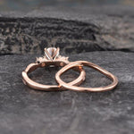 Load image into Gallery viewer, 1.00CT OVAL CUT ROSE GOLD INFINITY THREE STONE BRIDAL MOISSANITE ENGAGEMENT RING SET