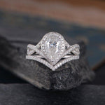 Load image into Gallery viewer, 1.00CT PEAR CUT WHITE GOLD INFINITY HALO PROMISE MOISSANITE ENGAGEMENT RING WITH STACKING BAND