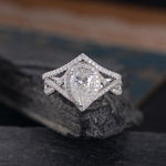 Load image into Gallery viewer, 1.00CT PEAR CUT WHITE GOLD INFINITY HALO PROMISE MOISSANITE ENGAGEMENT RING WITH STACKING BAND