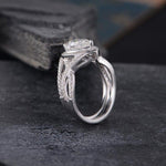 Load image into Gallery viewer, 1.00CT PEAR CUT WHITE GOLD INFINITY HALO PROMISE MOISSANITE ENGAGEMENT RING WITH STACKING BAND
