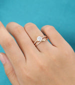 Load image into Gallery viewer, 1.00CT ROUND CUT ROSE GOLD HALF ETERNITY TWISTED WEDDING MOISSANITE ENGAGEMENT RING SET