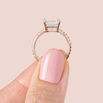Load image into Gallery viewer, EDGY BASKET ACCENTED EMERALD CUT MOISSANITE ENGAGEMENT RING