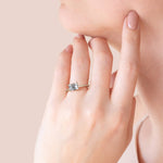 Load image into Gallery viewer, EDGY BASKET ACCENTED EMERALD CUT MOISSANITE ENGAGEMENT RING