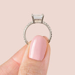 Load image into Gallery viewer, EDGY BASKET ACCENTED EMERALD CUT MOISSANITE ENGAGEMENT RING