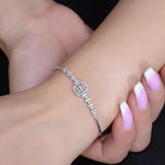 Load image into Gallery viewer, 14K SOLID GOLD BAGUETTE/ROUNDDIAMOND HALO BRACELET