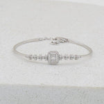 Load image into Gallery viewer, 14K SOLID GOLD BAGUETTE/ROUNDDIAMOND HALO BRACELET