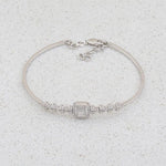 Load image into Gallery viewer, 14K SOLID GOLD BAGUETTE/ROUNDDIAMOND HALO BRACELET