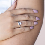 Load image into Gallery viewer, EAVE ACCENTED EMERALD CUT MOISSANITE ENGAGEMENT RING