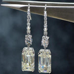 Load image into Gallery viewer, 5.00 TCW EMERALD CUT MOISSANITE BANGLE DROP EARRING