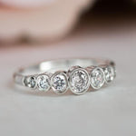 Load image into Gallery viewer, DELICATE BEZEL SET MOISSANITE DIAMOND WHITE GOLD ENGAGEMENT WEDDING STACKING RING
