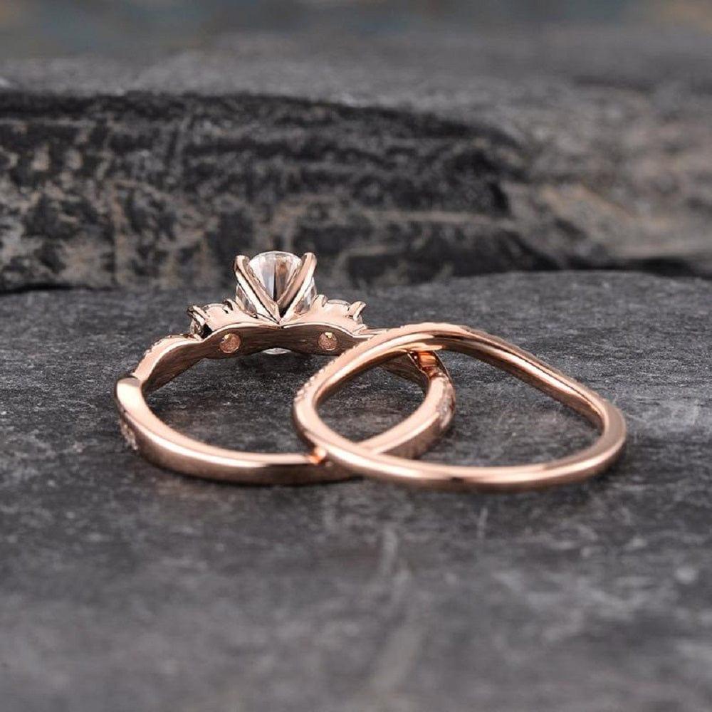 1.00CT OVAL CUT ROSE GOLD INFINITY THREE STONE BRIDAL MOISSANITE ENGAGEMENT RING SET