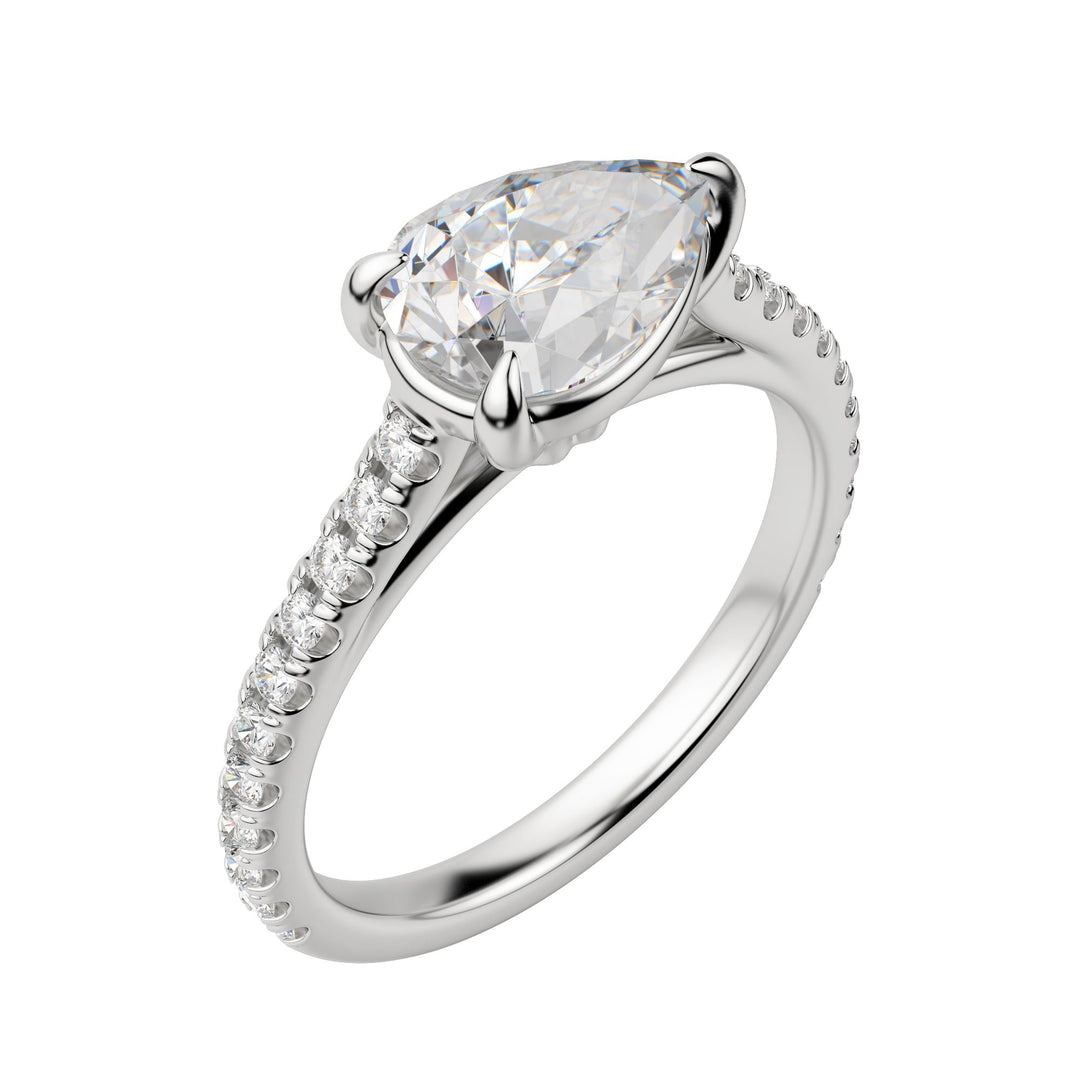 EDGY ACCENTED PEAR CUT MOISSANITE ENGAGEMENT RING