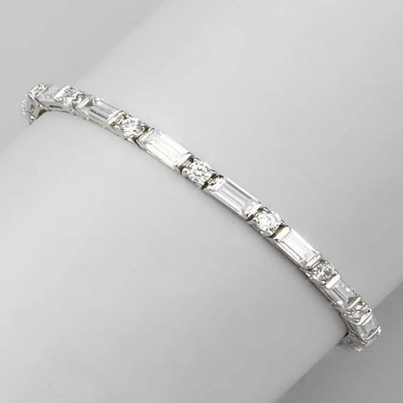 14K GOLD BAGUETTE AND ROUND DIAMOND TENNIS BRACELET