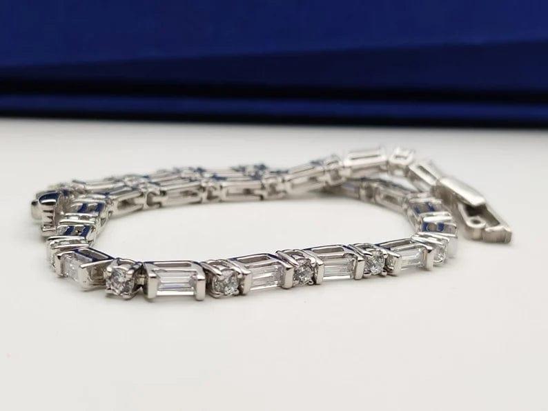 14K GOLD BAGUETTE AND ROUND DIAMOND TENNIS BRACELET