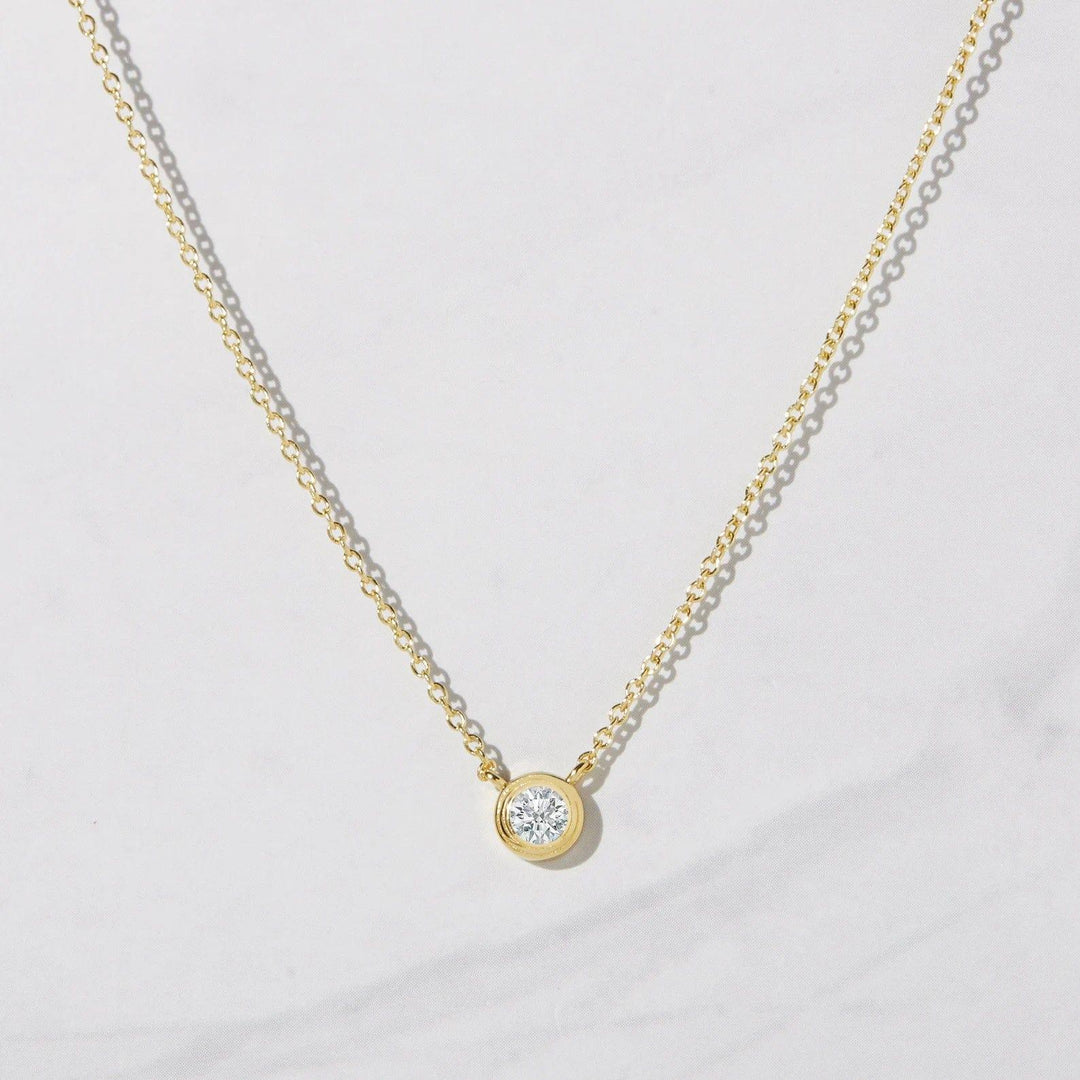 14K GOLD DAINTY BEZEL SET MOISSANITE DIAMOND SOLITAIRE ON BAIL NECKLACE