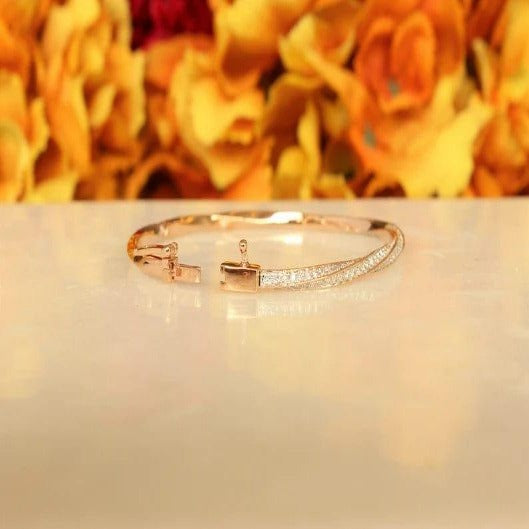 14K GOLD TWISTED FINEST ANNIVERSARY BANGLE BRACELET