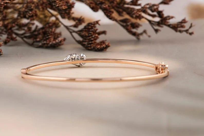 14K SOLID GOLD PEAR AND ROUND DIAMOND BANGLE BRACELET