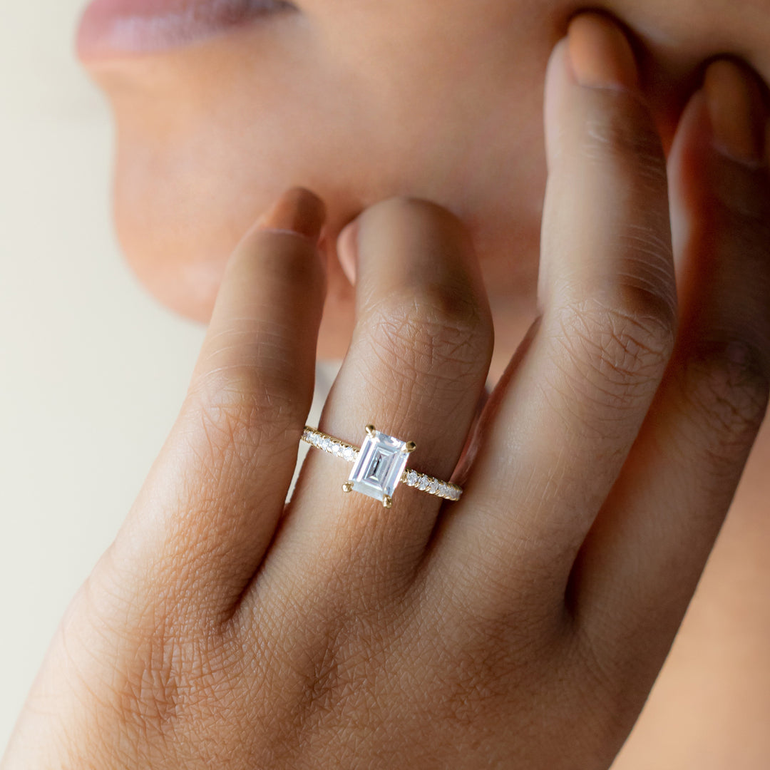 LYRE ACCENTED EMERALD CUT MOISSANITE ENGAGEMENT RING