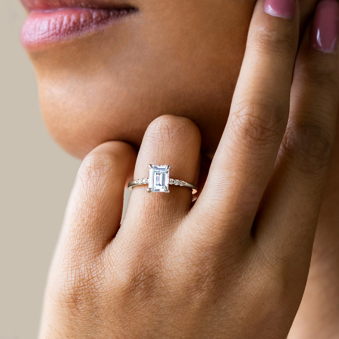 RHOS EMERALD CUT MOISSANITE ENGAGEMENT RING