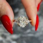 Load image into Gallery viewer, Oval 3.5 carat IGI Certified D Color VVS2 Clarity Lab Grown Diamond Three Stone Engagement Ring, Side Trillion Cut Diamonds 14k Yellow Gold image 1