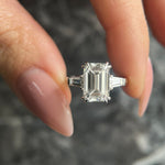 Load image into Gallery viewer, Emerald Cut 4.50 carat Rare D Color VVS2 Clarity IGI Certified Lab Grown Diamond Three Stone Engagement Ring, Side Baguettes 18k Gold image 2