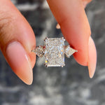 Load image into Gallery viewer, Radiant Cut 5.5 carat IGI Certified E Color VVS2 Clarity Lab Grown Diamond Three Stone Engagement Ring Side Kite Cut Diamonds 18k Gold image 1