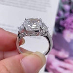 Load image into Gallery viewer, Asscher 5.40tcw Lab Diamond Ring | Trapezoid Side Stones | Three Stone | IGI Certified image 7