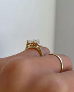 Load image into Gallery viewer, Close-up of radiant 3.0tcw lab grown diamond ring with raised cathedral setting, sparkling pave band, and hidden halo design. This sophisticated engagement ring is perfect for weddings, proposals, or anniversary celebrations. A luxurious and timeless diamond ring for her.