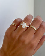 Load image into Gallery viewer, Detailed view of radiant 3.0tcw lab created diamond ring with a high cathedral setting, hidden halo glow, and pave-covered band. A breathtaking engagement or wedding ring for her, symbolizing timeless commitment with ethical, lab grown diamonds and exceptional craftsmanship.