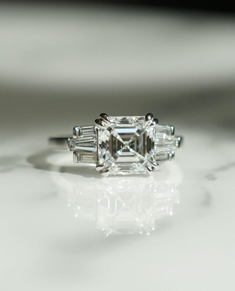 4.50 total carat weight Asscher lab created diamond engagement ring featuring double prong details, IGI certified for quality. A stunning anniversary gift or forever classic ring, perfect for marking milestones with elegance.