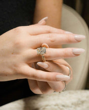 Detailed image of a 5.15tcw radiant lab created diamond ring featuring split shank band and pave prong setting. A glamorous bridal ring made for unforgettable proposals, this wedding diamond ring is perfect for women who want a big, bold look with sustainable sparkle and timeless elegance.