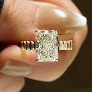 Radiant cut 5.15tcw lab grown diamond engagement ring with a bold pave prong setting and elegant split shank design. This ethically crafted wedding ring shines with brilliance and is perfect for proposals. Ideal for women who love luxurious, sustainable jewelry with large, eye-catching diamonds.