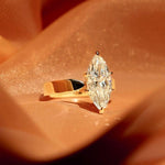 Load image into Gallery viewer, Stunning 2.50ct marquise cut lab grown diamond engagement ring featuring a unique flair shank design. This eye-catching bridal ring is perfect for weddings, anniversaries, or romantic gifts. A sustainable and stylish diamond ring that beautifully celebrates love for her or your special girl.