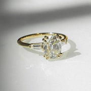 Cushion cut 1.60ct lab grown diamond engagement ring featuring a double claw three stone setting and bold dome shank design. A forever classic ring perfect for anniversaries or birthdays, this ethically crafted diamond ring for her offers timeless beauty and modern elegance.