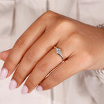 Load image into Gallery viewer, Avideri engagement ring with a round brilliant cut diamond for a sparkling proposal.