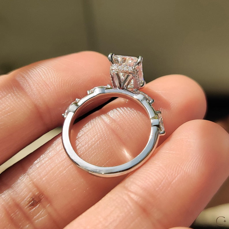 white gold ring set with five diamonds.