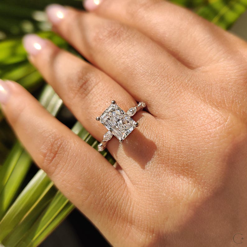 Radiant diamond ring designed with prong setting.