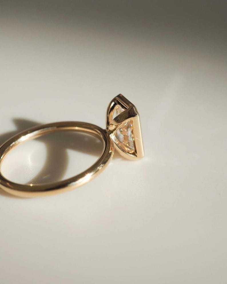 14k yellow gold, CVD diamond, IGL CERTIFIED, bezel set, diamond ring, emerald cut, emerald diamond, engagement ring, fine jewelry, lab created diamond, lab grown, lab grown diamond, wedding ring