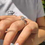 Load image into Gallery viewer, Hidden halo engagement ring includes marquise side stones.