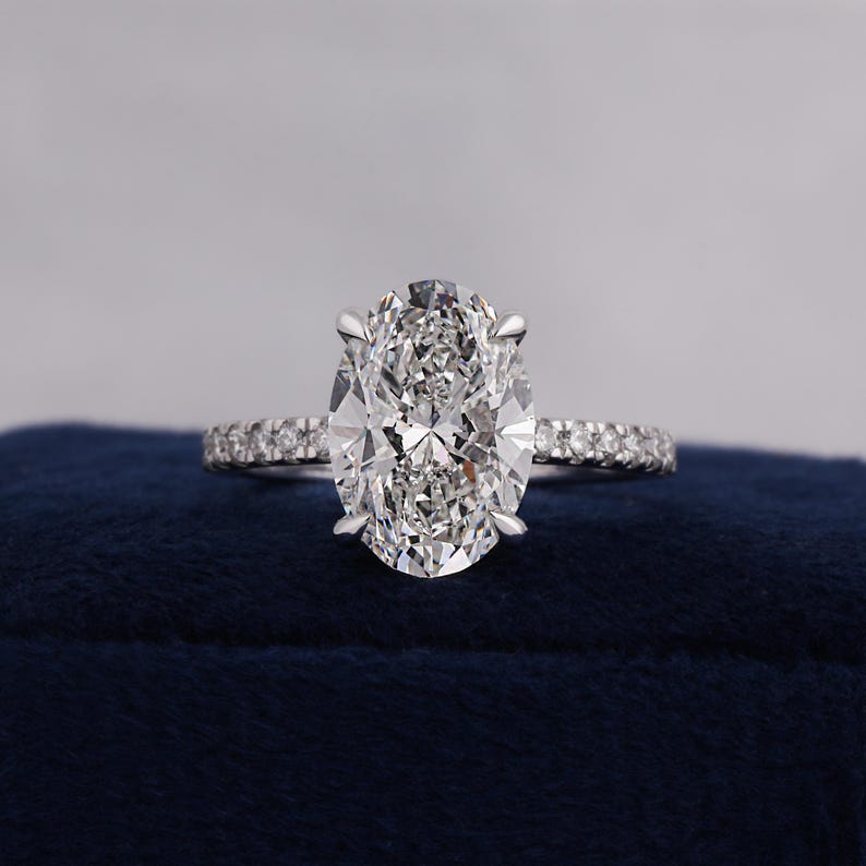 diamond ring, engagement ring, fine jewelry, engagement, wedding ring, wedding band, oval cut, cvd diamond, lab grown diamond, lab grown, lab created diamond, 14k yellow gold, hidden halo