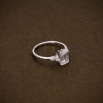 Load image into Gallery viewer, 1.95 CTW Emerald Cut Lab Grown Diamond Engagement Ring | IGI Certified Ring with Marquise &amp; Round Side Diamonds image 4