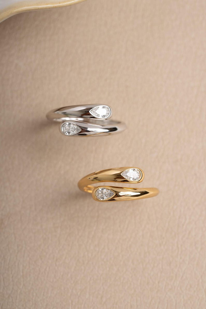 Sterling silver stackable ring and a gold spiral open ring