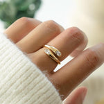 Load image into Gallery viewer, gold spiral cubic zirconia ring on model