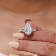 Lab grown pear shaped diamond halo engagement ring with split shank band