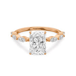 Load image into Gallery viewer, Rose gold ring with radiant cut lab grown diamond in center and marquise as side stone.